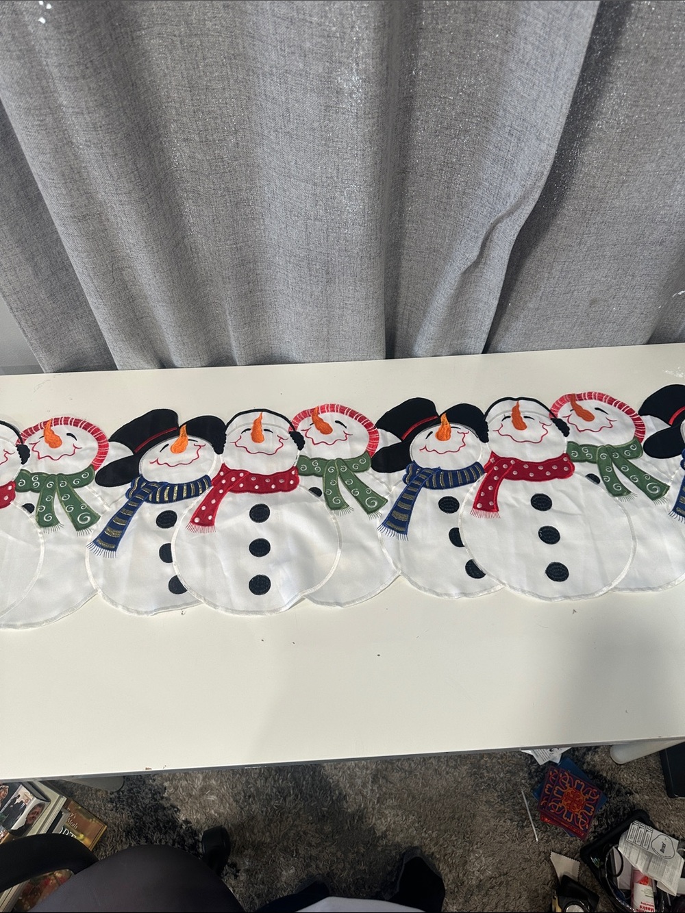 Festive Snowman Table Runner featuring embroidered snowman with Colorful Scarves